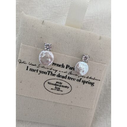 593 Small round simulated diamond earrings